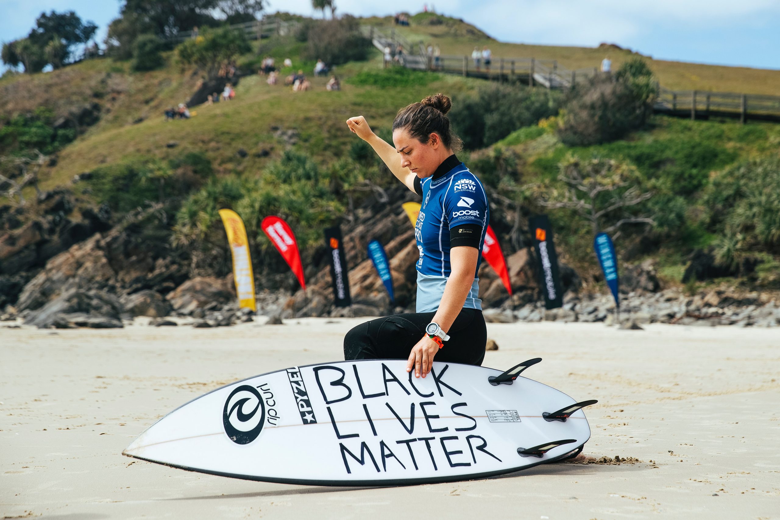 TWEED HEADS SOUTH, AUSTRALIA - SEPTEMBER 13: Tyler Wright, two-time World Surf League Champion, takes a knee in solidarity with Black Lives Matter ahead of her heat today at the Tweed Coast Pro event on September 13, 2020 in Tweed Heads South, Australia, part of the Australian Grand Slam of Surfing and the second event of The WSL Countdown. Wright knelt for 439 seconds - one second for every First Nations person in Australia who has lost their life in police custody since 1991. (Photo by Matt Dunbar/World Surf League via Getty Images)