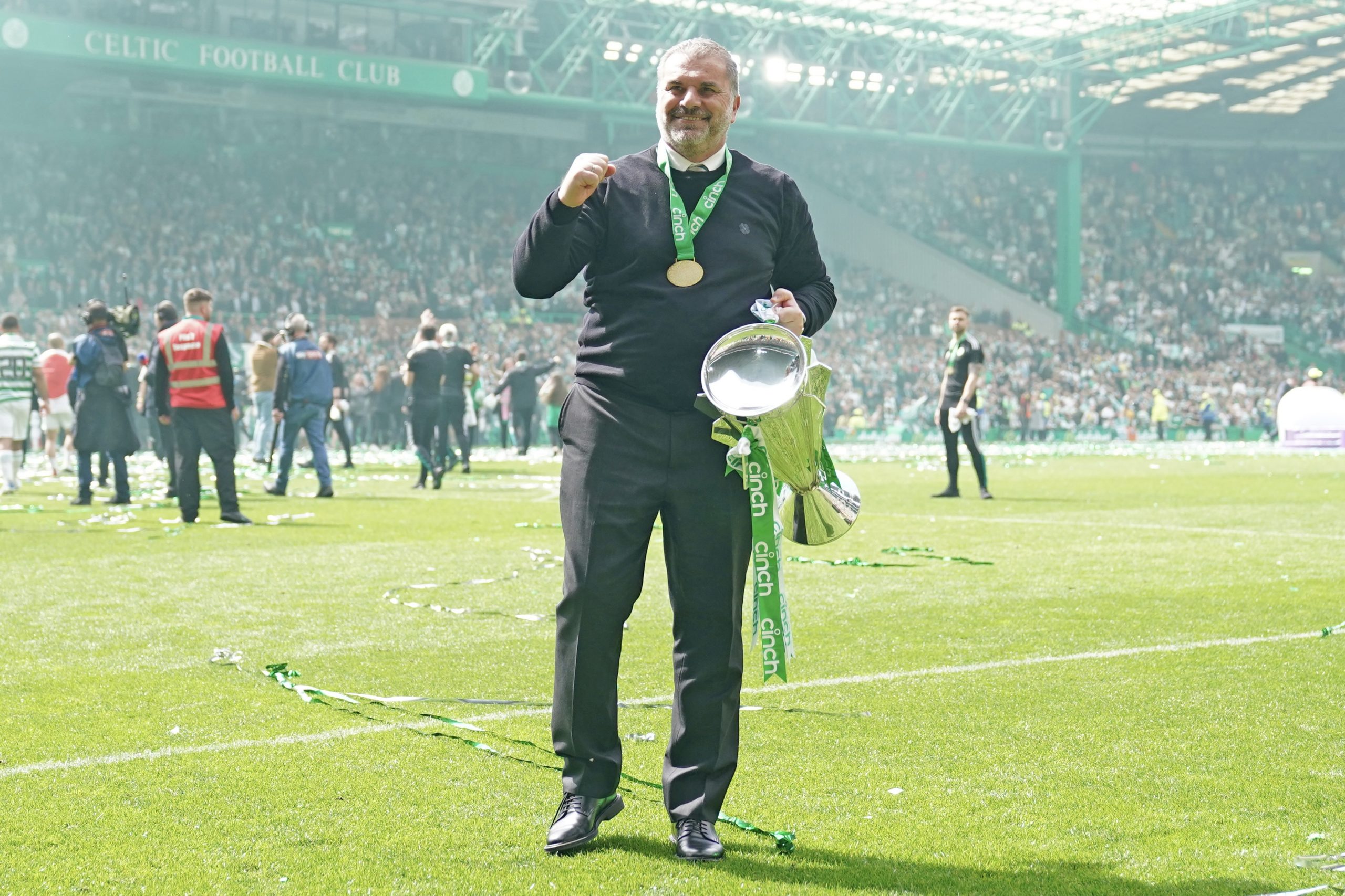 Celtic manager Ange Postecoglou celebrates with the league trophy after the cinch Premiership match at Celtic Park, Glasgow. Picture date: Saturday May 14, 2022.